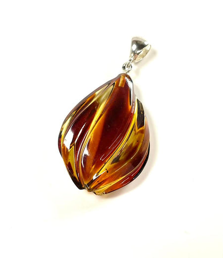 SS Amber Lady Smelling Roses Carved Pendant