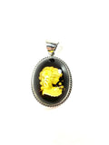 SS Amber Lady Smelling Roses Carved Pendant