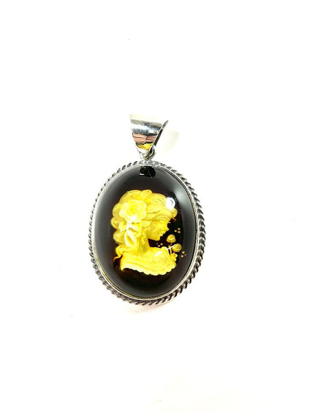 SS Amber Lady Smelling Roses Carved Pendant