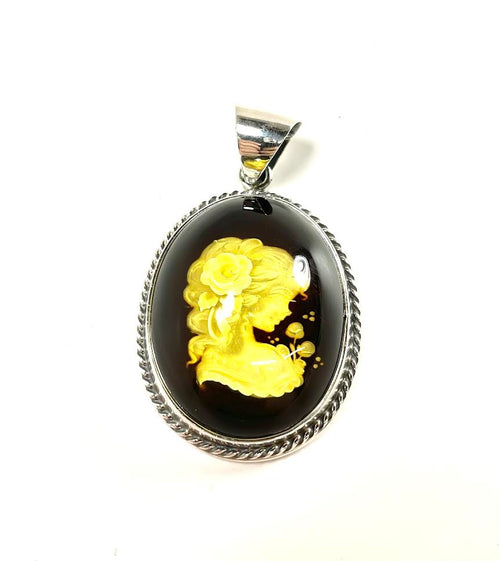 SS Amber Lady Smelling Roses Carved Pendant