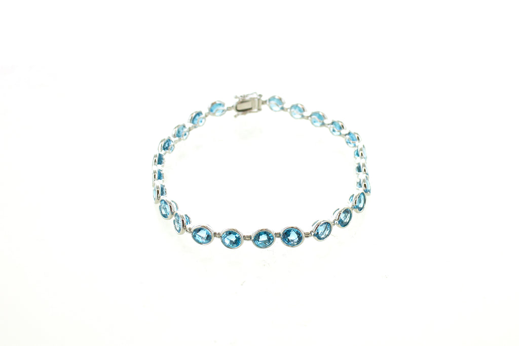 14KW Blue Topaz Bezel Bracelet