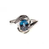 14KW London Blue Topaz Twist Bypass Ring