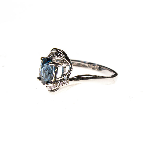 14KW London Blue Topaz Twist Bypass Ring