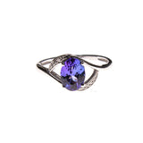 14KW Gold Cradled Tanzanite Oval Ring