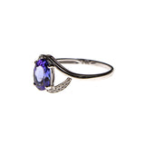 14KW Gold Cradled Tanzanite Oval Ring