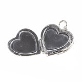 Sterling Silver Quatrefoil Heart Locket