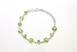 SS Peridot Oval and Diamond Bezel Bracelet