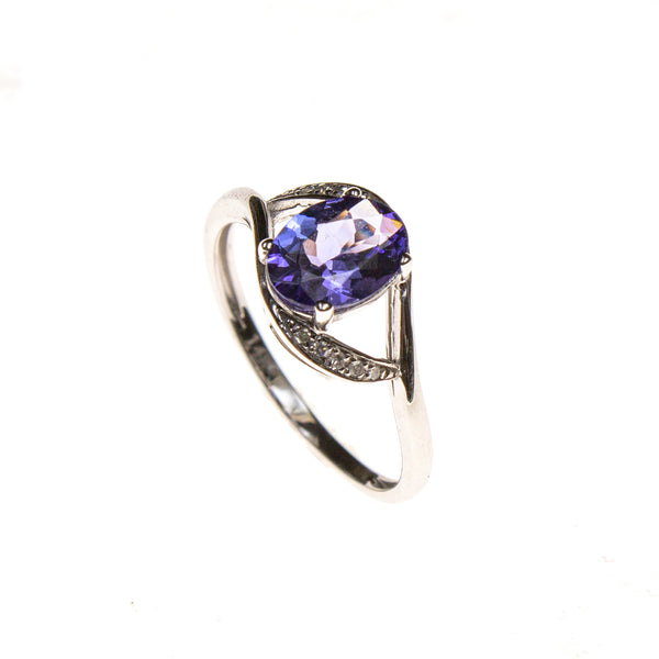 14KW Gold Cradled Tanzanite Oval Ring