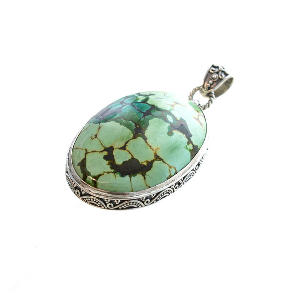 SS Pale Green Turquoise Pendant with Matrix in Scroll Bezel